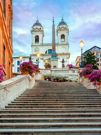 Piazza de Spagna in Rome, Italy. Spanish steps in Rome, Italy in the morning. One of the most famous squares in Rome, Italy. Architecture and landmarks of Rome. | © Shutterstock 2245976927