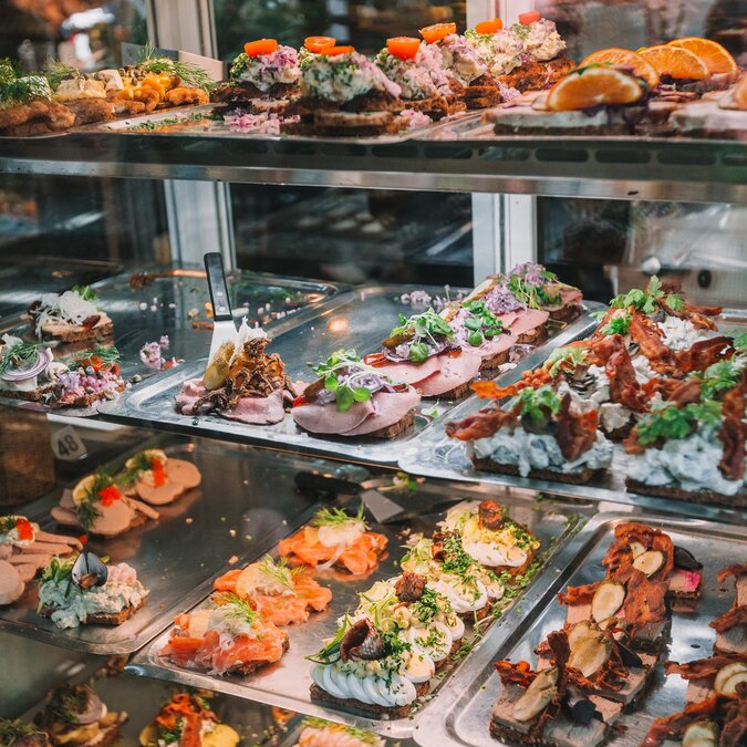 The restaurant at the Copenhagen food market serves open sandwiches, a local delicacy.  | © Shutterstock 1950900790