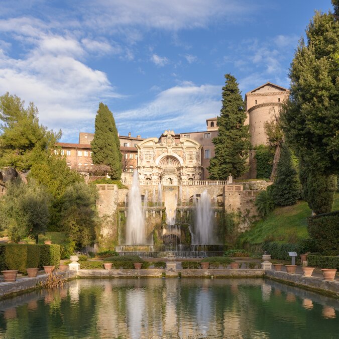 Villa d'Este, Tivoli, Italy. The Neptune Fountain and the Organ Fountain with its Castellum aqua, or water castle over the fish ponds | © Shutterstock 2484725185