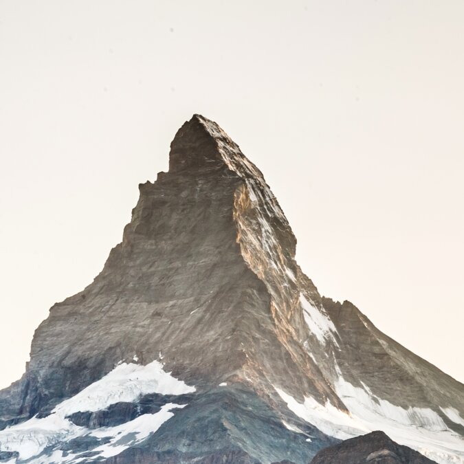 Zermatt, Switzerland. Matterhorn mountain near Grindjisee with flowers in the foreground. Canton Valais. | © Shutterstock 2463962649